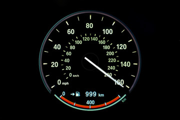 260 Kilometers per hour,light with car mileage with black background,number of speed,Odometer of car.	
