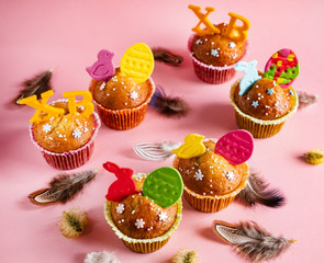 Various Spring Easter cakes on pink background