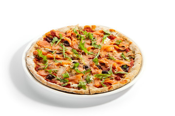 Sliced pizza with salmon, calamata olives and sun dried tomatoes