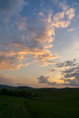 Sunrise or sunset over the hills and meadow. Slovakia