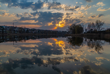 Sunset. Seeing today on the lake in the village of Luka. Kiev region. Ukraine. March 28, 2020.