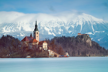 Lake Bled, Slovenia. Image of Lake Bled with small Bled Island during spring sunrise. Bled, Slovenia, Europe.	