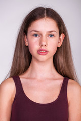Fototapeta premium Close up portrait of a young beautiful woman