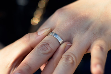 Obraz premium Hand with a silver ring