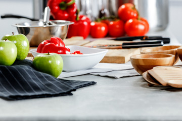 Kitchen background and hands with vegetables 