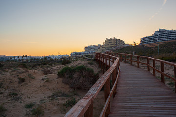 Fototapeta premium Lonely beach walk at dusk