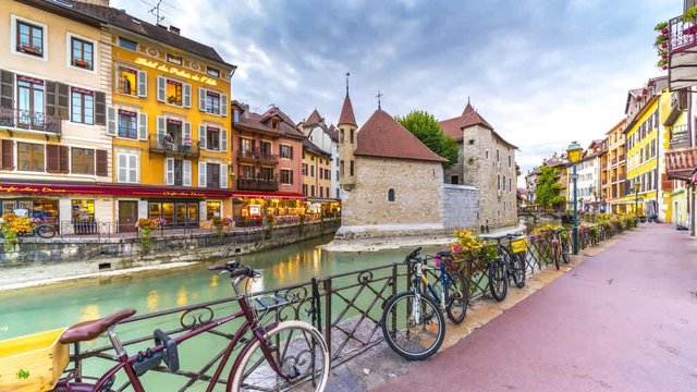 Annecy castle old town view of river and lake annecy time lapse hyperlapse from day to night.