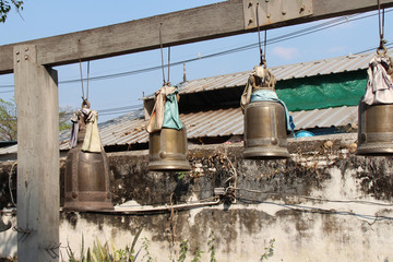 bells in a buddhist temple (wat si chum) in lampang (thailand)