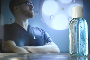 female doctor disinfects hands with antiseptic, doctor's hands clean gloves antiseptic, virus protection conronavirus