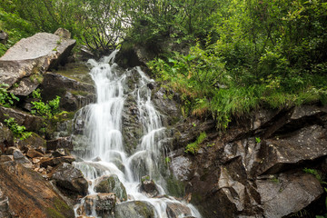 Fototapeta premium waterfall in mountains Ukrainian Carphatian