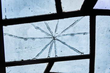 detail of a broken glass, it is a part of an old stained glass window