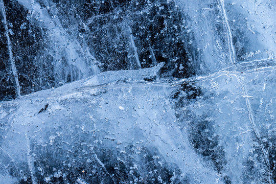 Close up of the ice of a clear frozen river © Ilkka