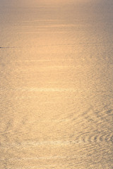 Just the horizon over the water of the mediterranean sea at sunset time with a warm soft light 