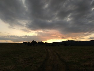 Sunrise or sunset over the hills and meadow. Slovakia