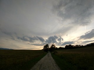 Sunrise or sunset over the hills and meadow. Slovakia