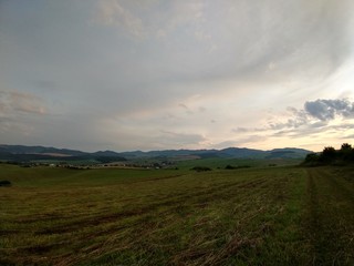 Sunrise or sunset over the hills and meadow. Slovakia