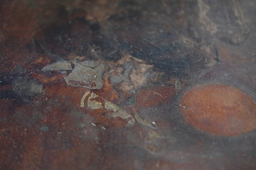 Rusty metal texture grunge background with old dirty brown stain pattern on damaged steel wall surface. Vintage rough iron metallic plate with rust detail