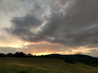 Sunrise or sunset over the hills and meadow. Slovakia