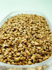 Buckwheat stocks are ready for quarantine due to the coronavirus pandemic, covid-19. Texture of buckwheat, close-up.