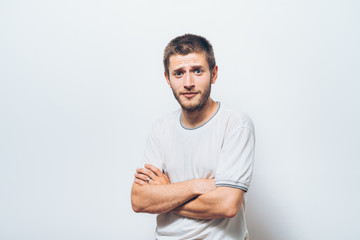 Portrait of a man arms folded