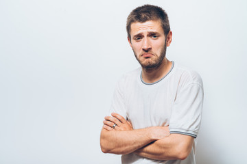 Portrait of a man arms folded