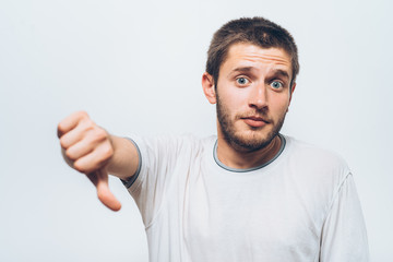 Fototapeta premium man showing a thumb down gesture