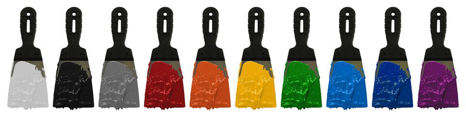 Multi-colored paint on a spatula isolated