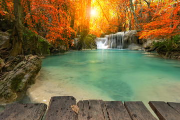 A beautiful waterfall deep in the tropical forest steep mountain adventure in the rainforest.