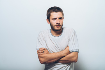 Portrait of a man arms folded