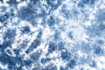 tie dye pattern hand dyed on cotton fabric abstract texture background.
