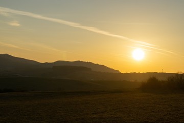 Obraz premium Sunrise or sunset over the hills and meadow. Slovakia