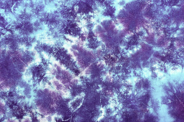 tie dye pattern hand dyed on cotton fabric abstract texture background.