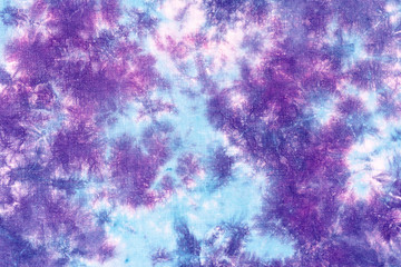 tie dye pattern hand dyed on cotton fabric abstract texture background.