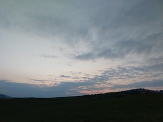 Sunrise or sunset over the hills and meadow. Slovakia