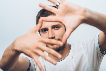 Obraz premium man making frame hand