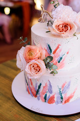 wedding cake with red roses