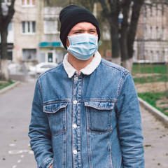 A man in a viral mask and in protective gloves, protection in prevention for coronavirus. 