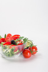Healthy vegetables for dietary snack, cherry tomatoes, pepper, green salad, arugula