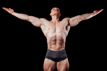 Fototapeta na wymiar male man bodybuilder sportsmen muscular biceps fitness