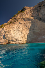 Fototapeta na wymiar Beautiful cliffs and water at White Beach on Zakynthos