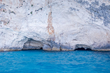 Two beautiful blue caves near Porto Vromi Maries in the early morning