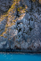Cliff interacting with the water below near Porto Vromi Maries