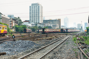 Thai railway train with locomotive runs in Bangkok