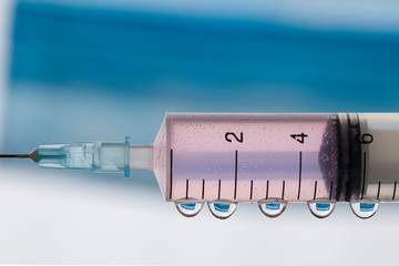 Syringe that contains serum: research of the antivirus to defeat Sar-Cov-2 cause of the pandemic...