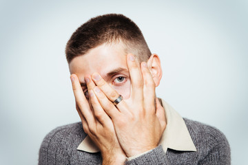 Watch Through his Fingers.