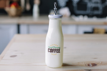 coffee milkshake. milk cocktail in a glass bottle. morning breakfast
