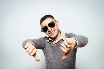 man showing a thumb down gesture