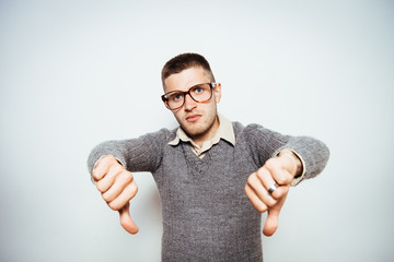 man showing a thumb down gesture