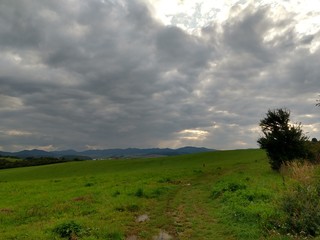 Sunrise or sunset over the hills and meadow. Slovakia