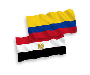 Flags of Colombia and Egypt on a white background